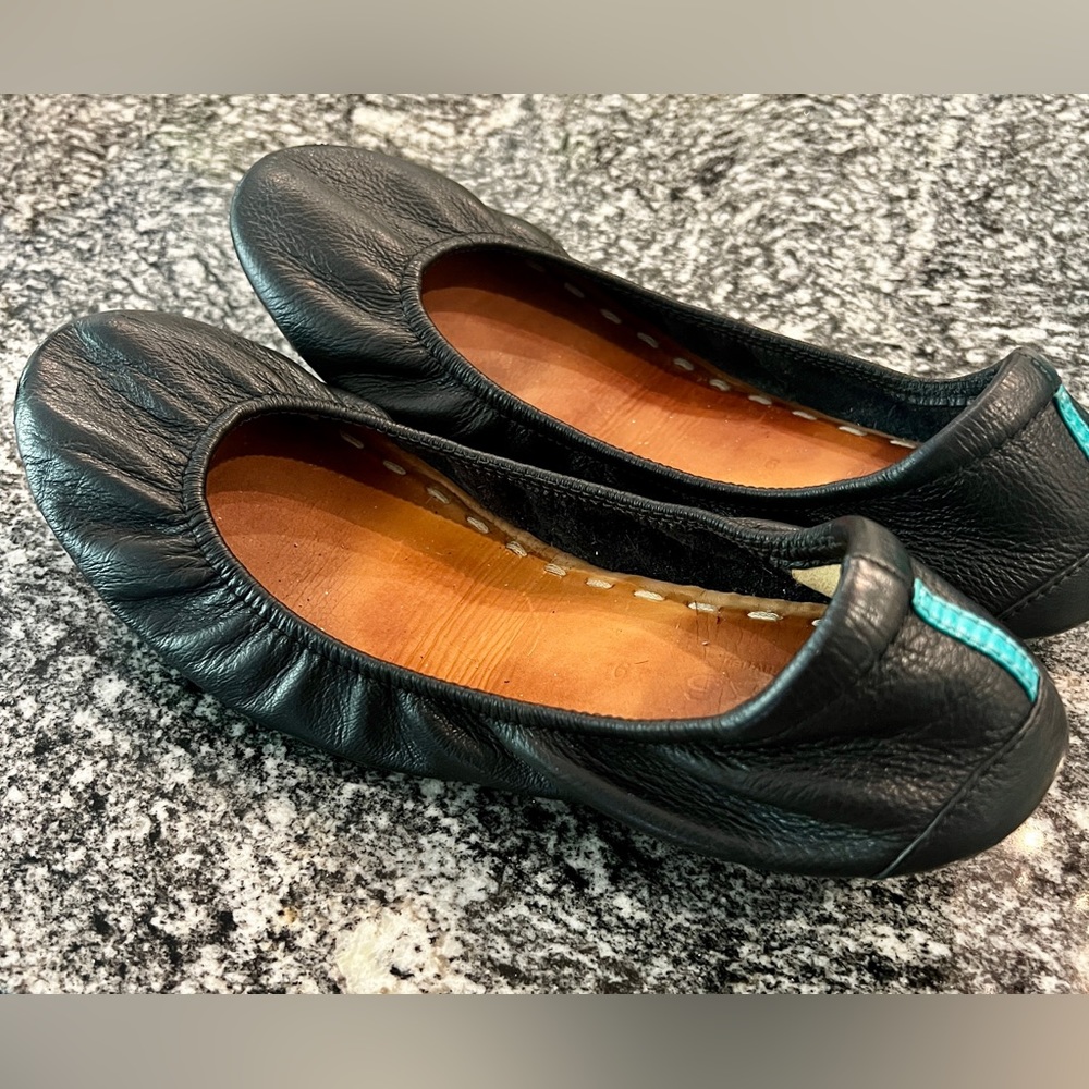 A pair of used size 9 Matte Black Tieks by Gavrieli